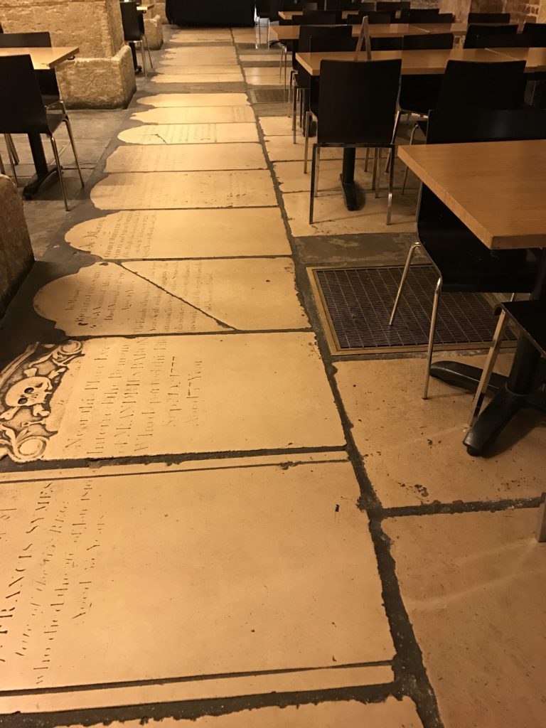 Gravestones on the floor of the Crypt Cafe, Dec. 2016