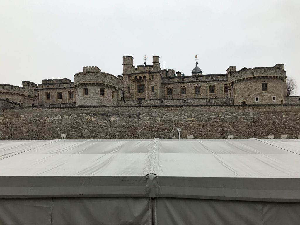 Tower of London in the background, cover of ice skating rink the foreground (the rink is in the tower moat!) London, Dec. 2016.