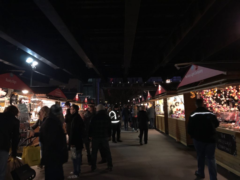 Christmas Market at the foot of the Golden Jubilee Bridge. London, Dec. 2016.
