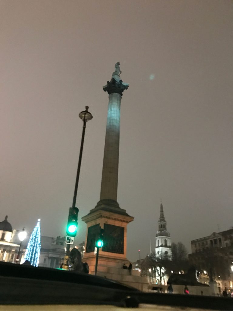 Trafalgar Square at night with Christmas Tree and St. Martin of the Fields Church.