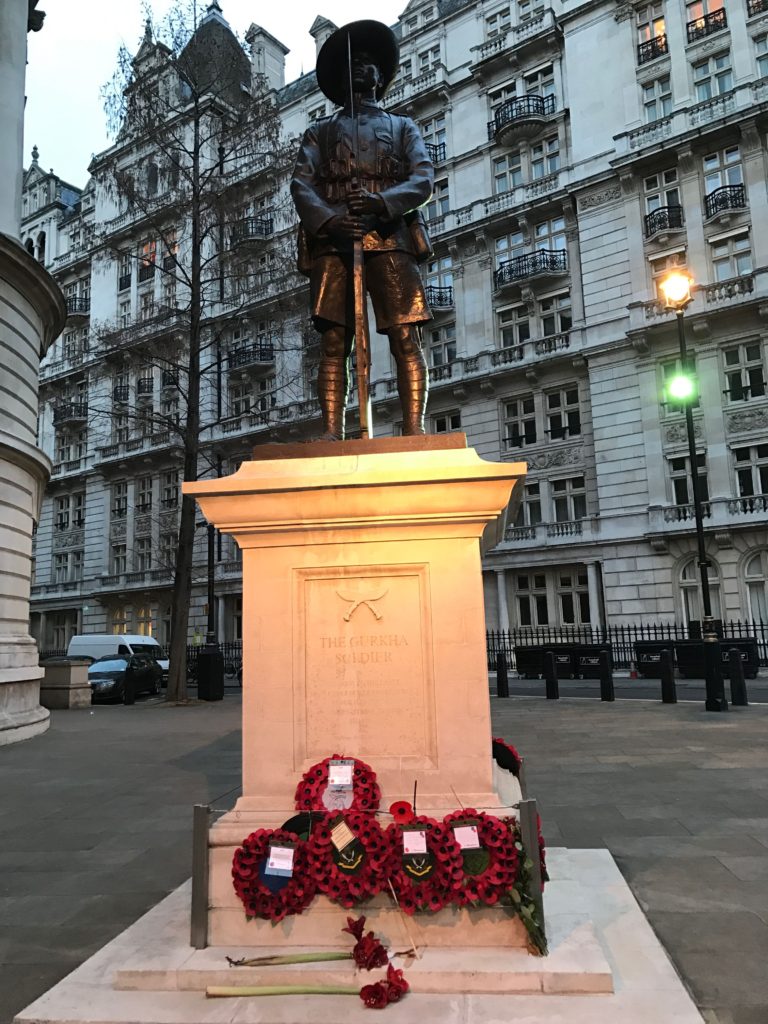 A military memorial with wreaths of poppies, a traditional remembrance in Britain. London, Dec. 2016.